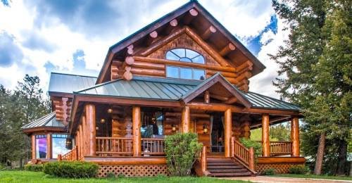 See This Charming Log Cabin With Beautiful Interior